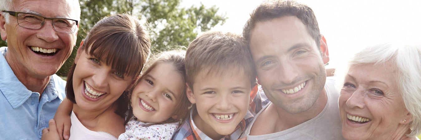 Happy family smiling for a picture